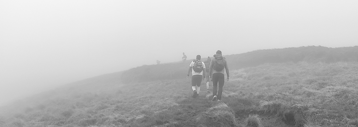 Kubus Brecon 10 Peaks walkers in the mist